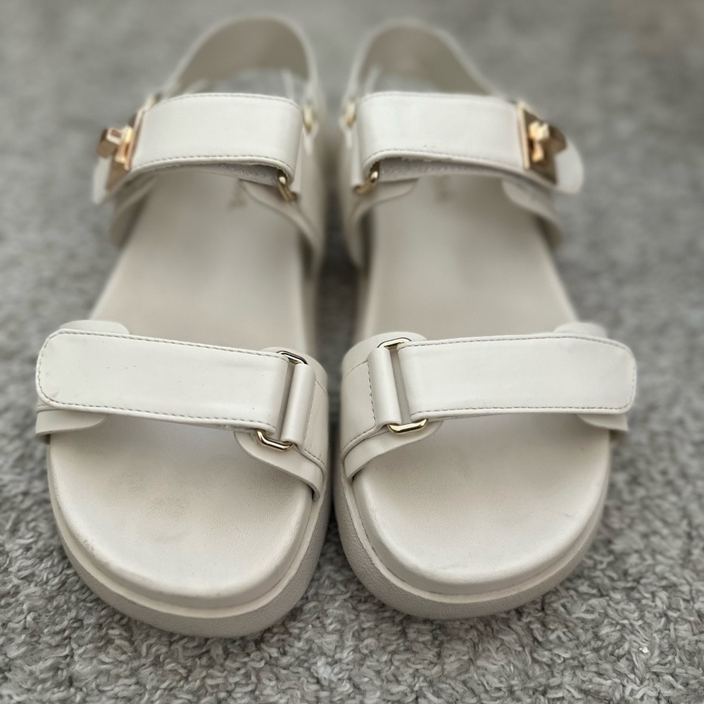 Soda White Sandals with Gold Buckles